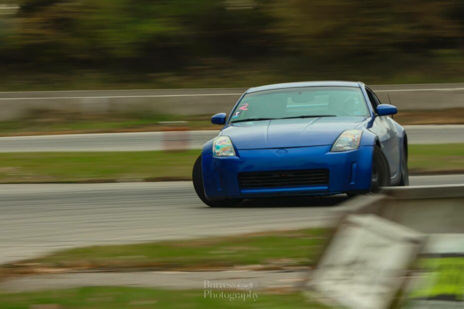 blue 350z drifting sideways